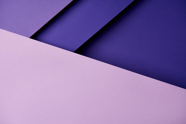 Paper sheets in purple tones background