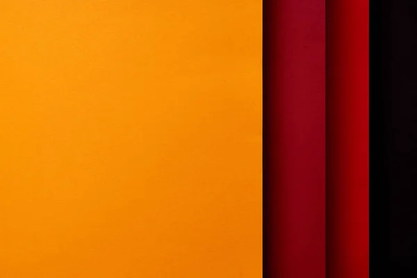 Papierblätter Roten Und Gelben Tönen Hintergrund — Stockfoto