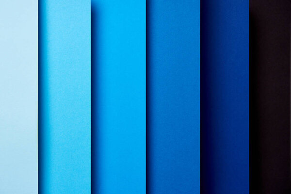 Pattern of overlapping paper sheets in blue tones
