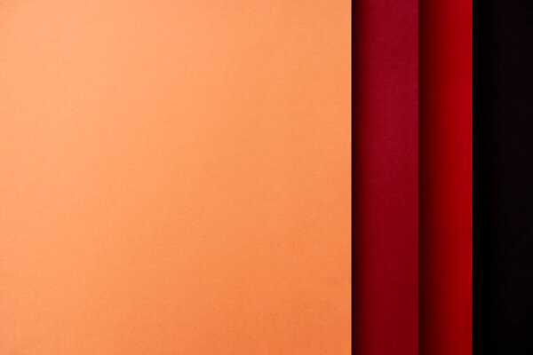 Abstract background with paper sheets in red and orange tones