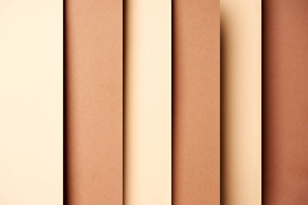 Abstract background with paper sheets in beige and brown tones
