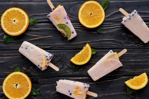 Top View Gourmet Homemade Ice Cream Orange Slices Mint Dark — Stock Photo, Image