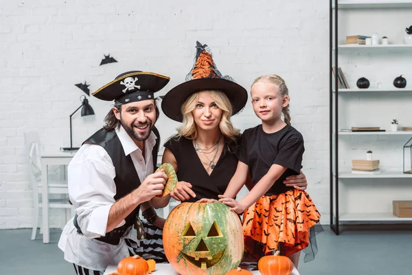 Portrait Parents Little Daughter Halloween Costumes Table Pumpkins Home — Stock Photo, Image