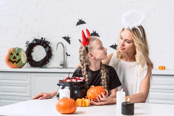 Portrait Mother Daughter Halloween Costumes Table Sweets Black Pot Kitchen — Stock Photo, Image