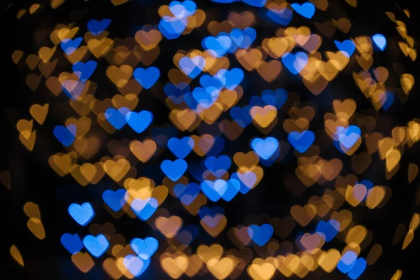Quadro Completo Dourado Azul Desfocado Corações Bokeh Luzes Fundo Preto — Fotografia de Stock