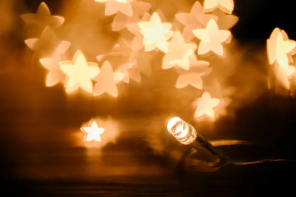 Close View Festive Garland Stars Bokeh Lights Backdrop — Stock Photo, Image