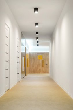 empty hallway with doors and lamps in kindergarten clipart