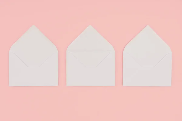 Top View Open White Envelopes Isolated Pink — Free Stock Photo