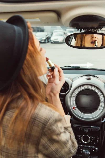 Partial View Woman Looking Back Mirror Using Red Lipstick Car — Stock Photo, Image