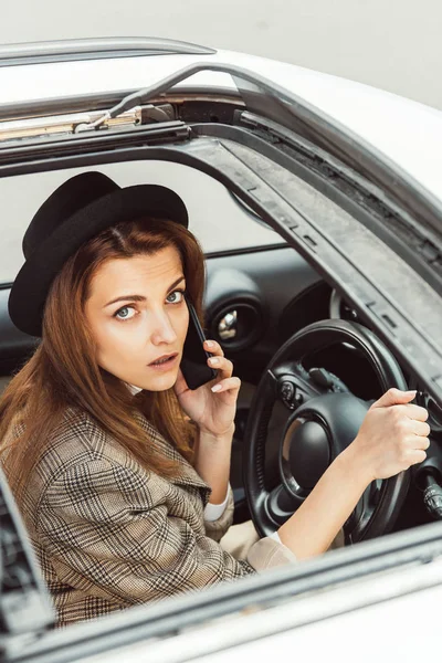 Portrait Stylish Woman Black Hat Talking Smartphone While Sitting Steering — Free Stock Photo