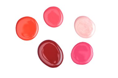 top view of glossy nail varnish on different colors isolated on white  clipart