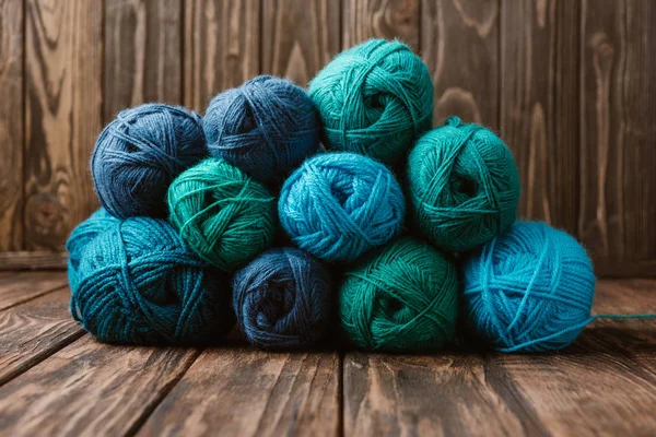 Close View Blue Green Yarn Clews Wooden Surface — Stock Photo, Image