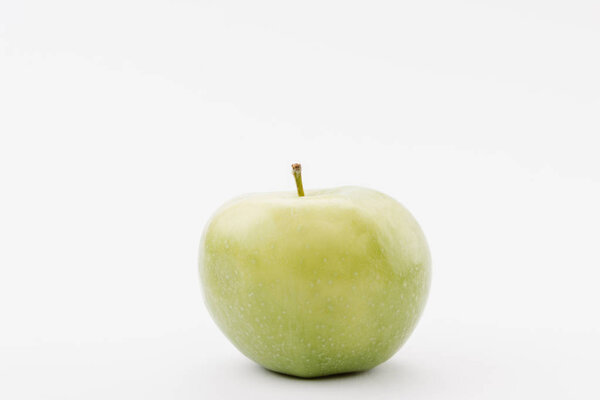 large ripe green apple on white background
