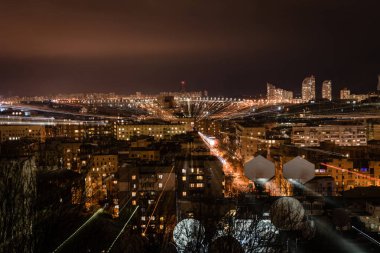 night cityscape with defocused bright illumination clipart