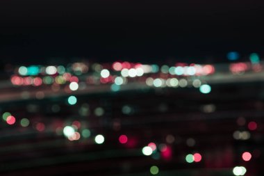 blurred colorful bokeh lights at night clipart