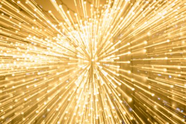 long exposure of blurred shiny golden bokeh lights clipart