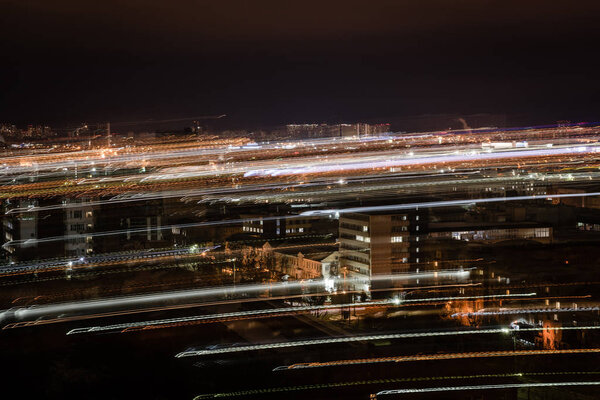 long exposure of cityscape with blurred lights at night