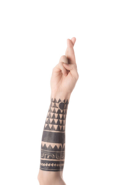 cropped view of tattooed man showing letter R in deaf and dumb language isolated on white