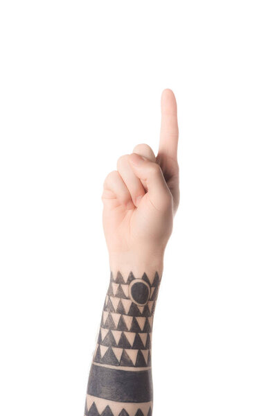 cropped view of tattooed man hand showing number 1 in sign language isolated on white