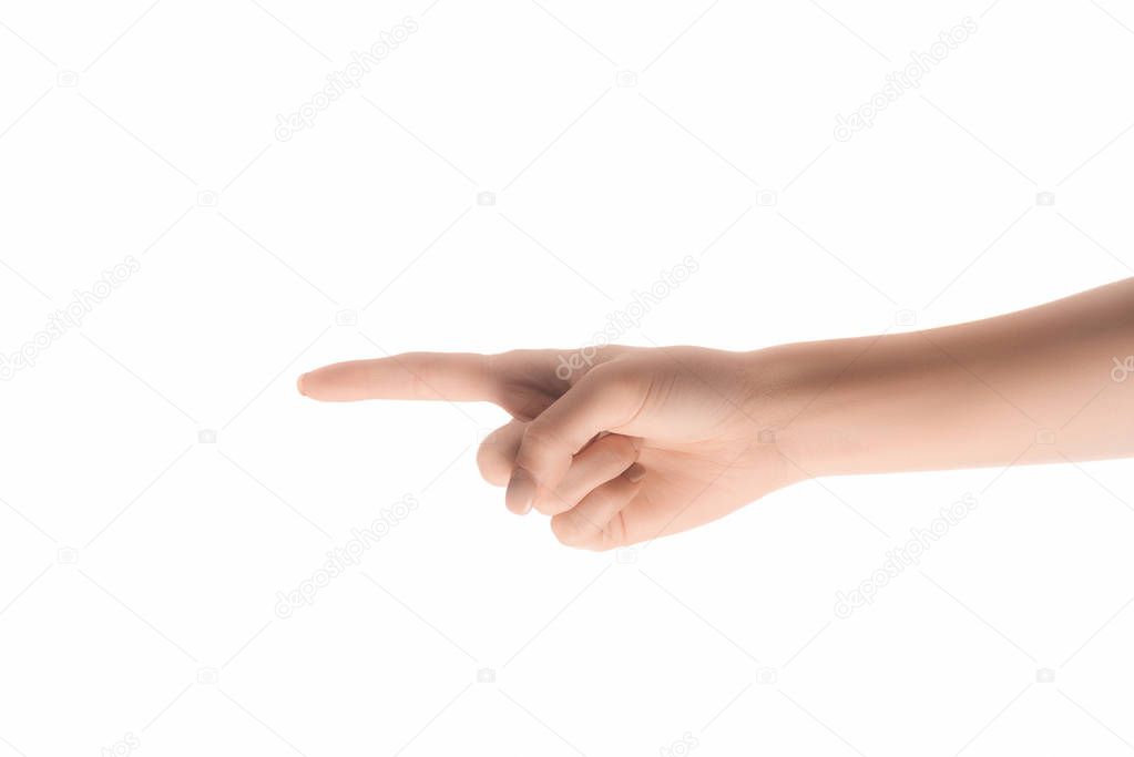 partial view of woman pointing left with finger isolated on white