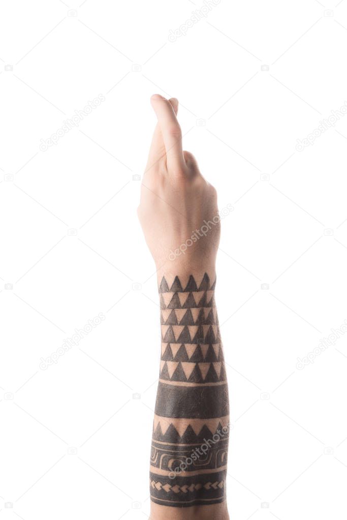 Partial view of tattooed man showing letter R in deaf and dumb language isolated on white