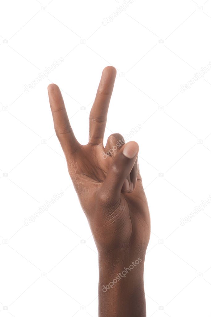 partial view of african american man showing number 2 in sign language isolated on white