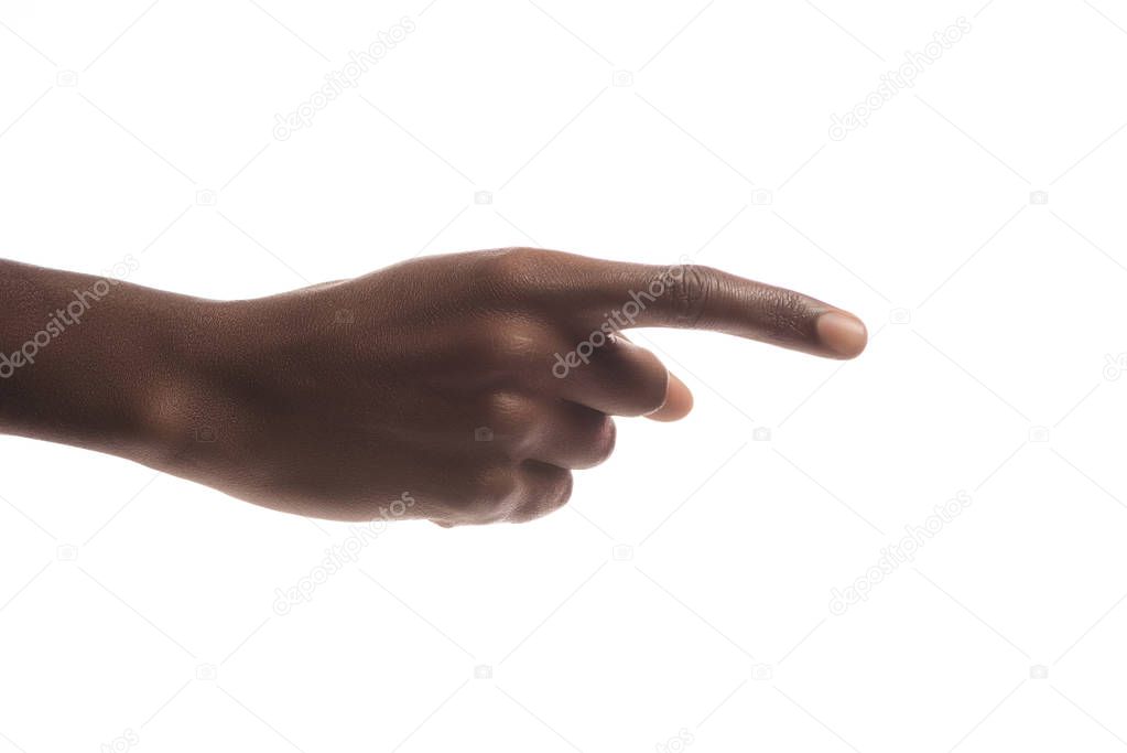 cropped view of african american man pointing right with finger isolated on white