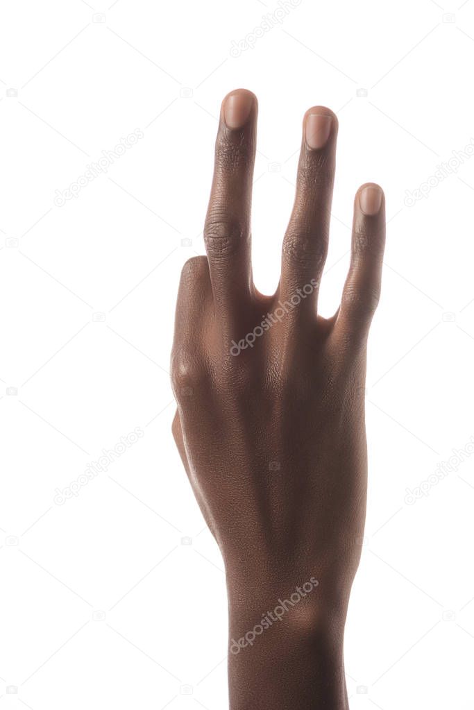 partial view of african american man showing letter F in deaf and dumb language isolated on white