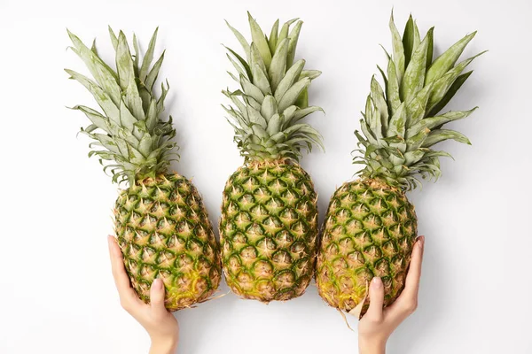 Cropped View Woman Holding Delicious Pineapples Hands White Background — Stock Photo, Image