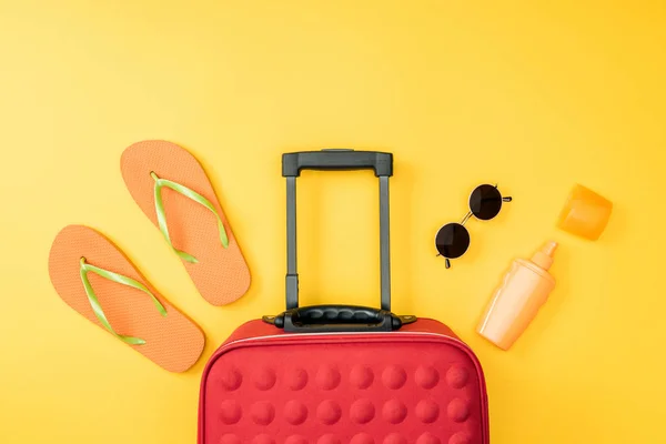 Top View Travel Bag Flip Flops Sunglasses Yellow Background — Stock Photo, Image