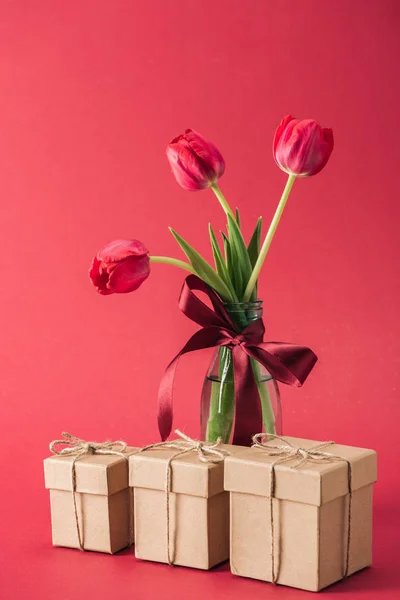 Gift Boxes Bouquet Red Tulips Red Satin Bowl Glass Vase — Stock Photo, Image
