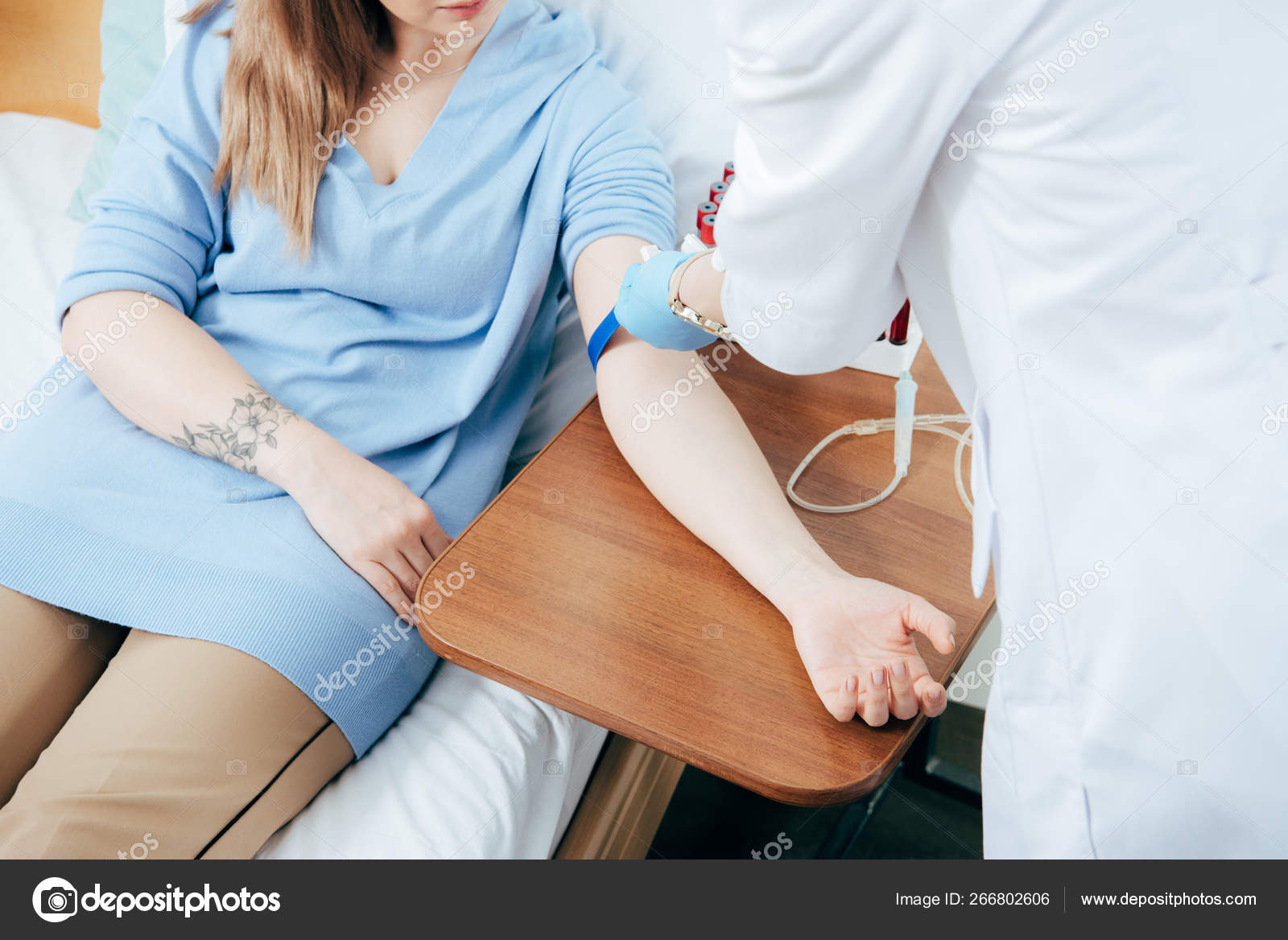Partial View Doctor Using Tourniquet Blood Test Hospital Stock Photo by ©MicEnin 266802606