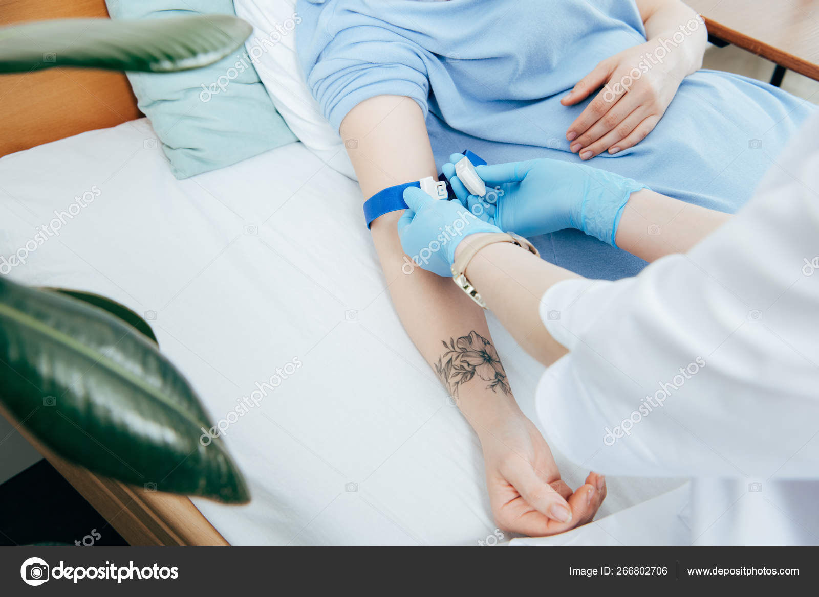Partial View Doctor Using Tourniquet Blood Test Hospital Stock Photo by ©MicEnin 266802706