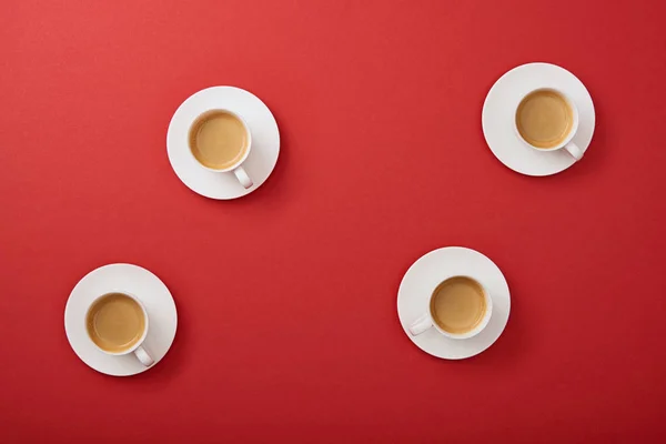 Top View White Cups Delicious Coffee Saucers Red Background — Stock Photo, Image