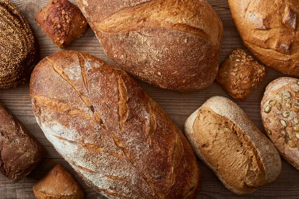 Top View Fresh Homemade Loaves Bread Buns Wooden Rustic Table — Stock Photo, Image