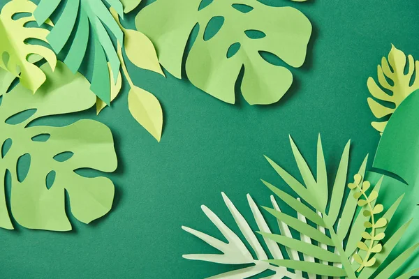 Top View Exotic Paper Cut Palm Leaves Green Background Copy — Stock Photo, Image