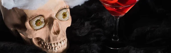 Panoramic Shot Red Cocktail Decorated Spooky Skull Black Background — Stock Photo, Image