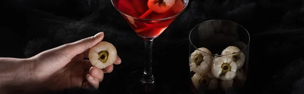 Panoramic Shot Woman Holding Decoration Red Halloween Cocktail Black Clouds — Stock Photo, Image