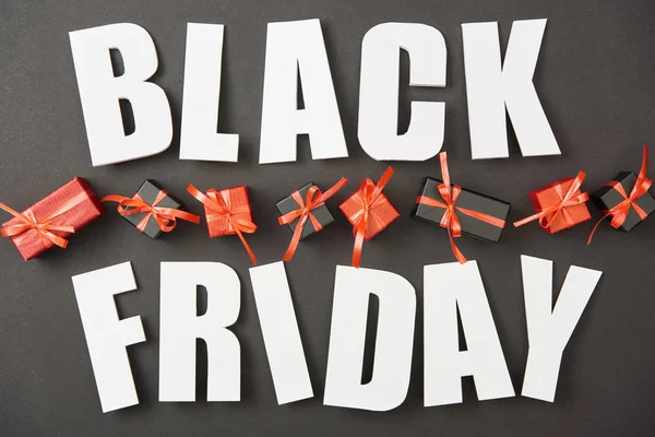 Top View Black Friday White Lettering Presents Black Background — Stock Photo, Image