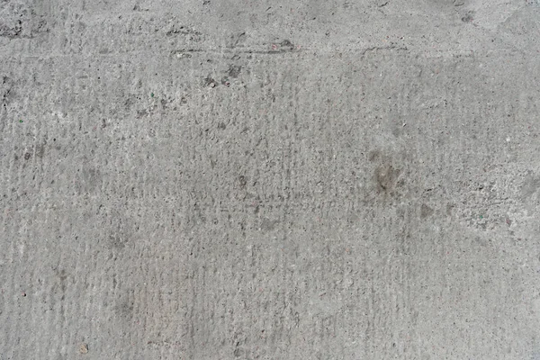 Vue rapprochée de vieux ciment gris vieilli — Photo de stock