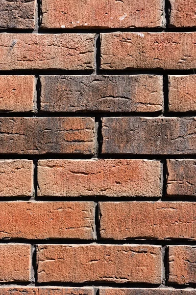 Close-up view of brown weathered brick wall background — Stock Photo