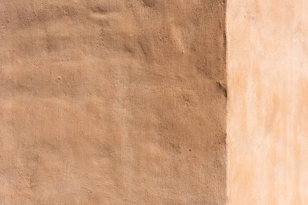Leere hellbraune Zementwand Hintergrund — Stockfoto