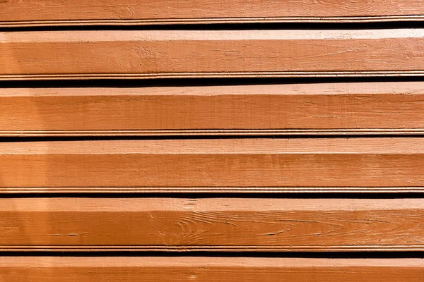 Close-up view of brown wooden background with horizontal planks — Stock Photo