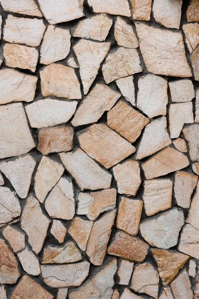 Vista de cerca del fondo grueso de la pared de piedra gris - foto de stock