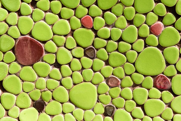 Close-up view of beautiful decorative green and maroon stones, creative background — Stock Photo