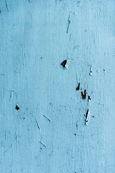 Close-up view of old scratched blue wall background — Stock Photo