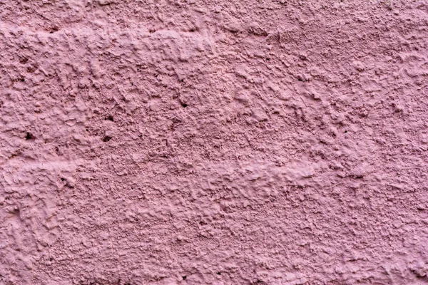 Vue rapprochée du vieux mur de ciment violet fond texturé — Photo de stock