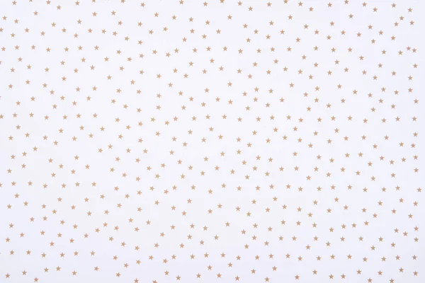 Abstract pattern with golden stars on white background — Stock Photo