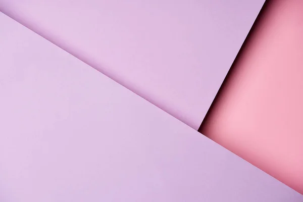 Fundo abstrato com folhas de papel em tons roxos e rosa — Fotografia de Stock