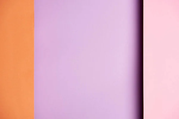 Padrão de folhas de papel sobrepostas em roxo e laranja — Fotografia de Stock